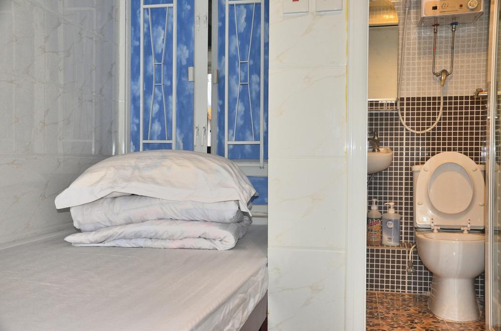 Xing Xing Hostel Хонконг Стая снимка
